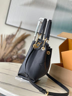 Bundle 28 in schwarzem Monogramm Empreinte Leder goldene Beschläge