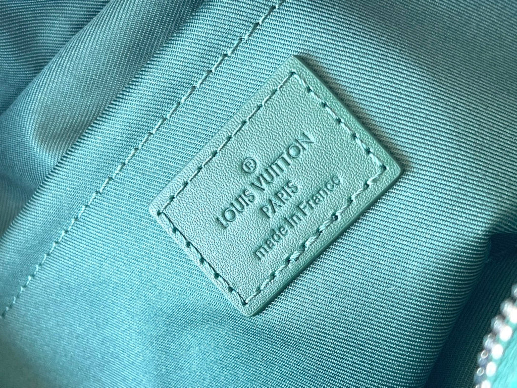 LOCKER DOPP KIT 28 AUS GRÜNEM MONOGRAM HERITAGE CANVAS