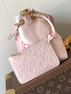 BÜNDELTASCHE 28 AUS ROSA MONOGRAMM-EMPREINTE-RINDSLEDER