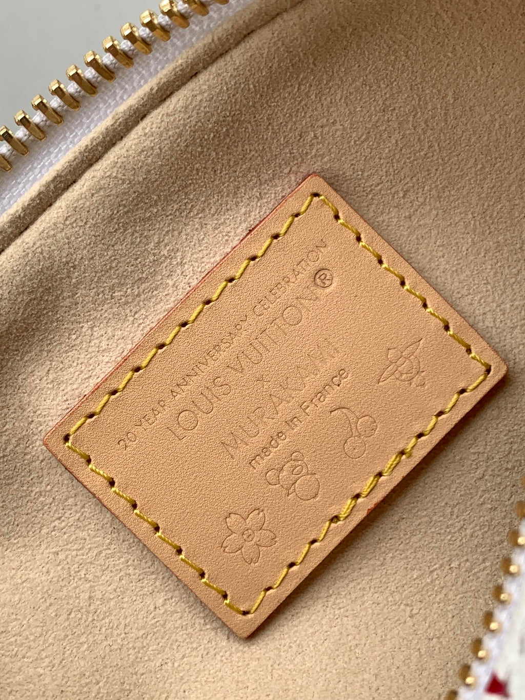 NANO SPEEDY BAG 16 IN FARBENFROHES MONOGRAMMMUSTER UND WEISS BESCHICHTETES CANVAS