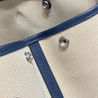 GARDEN PARTY 36 IN NAVY CREAM TOILE H CANVAS BLUE MARINE CALFSKIN ABSTRACT BEAR FACE PRINT