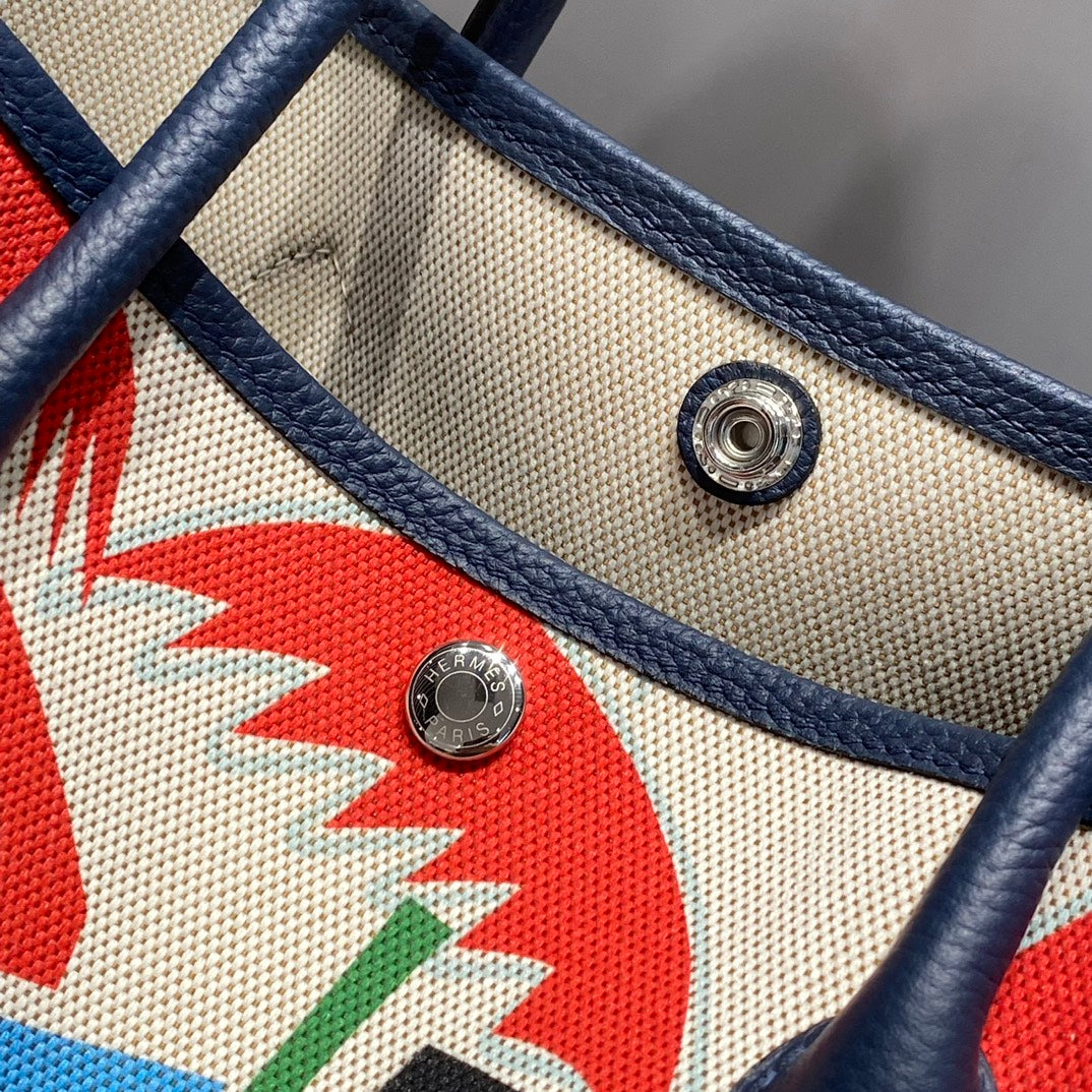 GARDEN PARTY 36 IN MULTICOLOR TOILE H CANVAS BLUE NAVY CALFSKIN TROPICAL ABSTRACT LANDSCAPE PRINT