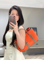 GARDEN PARTY 30CM IN ORANGE MINIMUM TOILETS COTTON CANVAS AND BROWN CALFSKIN