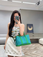 GARDEN PARTY 30CM IN CADMIUM GREEN TOILETS COTTON CANVAS AND GREEN CALFSKIN