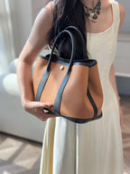 GARDEN PARTY 30CM IN ORANGE MINIMUM TOILETS COTTON CANVAS AND BLACK CALFSKIN