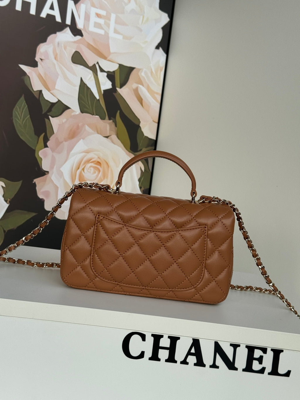 FLAP BAG 20 IN BRONZE BROWN LAMBSKIN WITH HANDLE