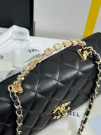 Klapptasche 18 mit Griff aus schwarzem Kalbsleder mit goldenen Beschlägen 