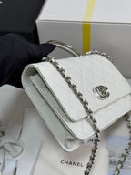 FLAP BAG WITH SILVER-TONE HANDLE 19 IN WHITE CAVIAR SKIN