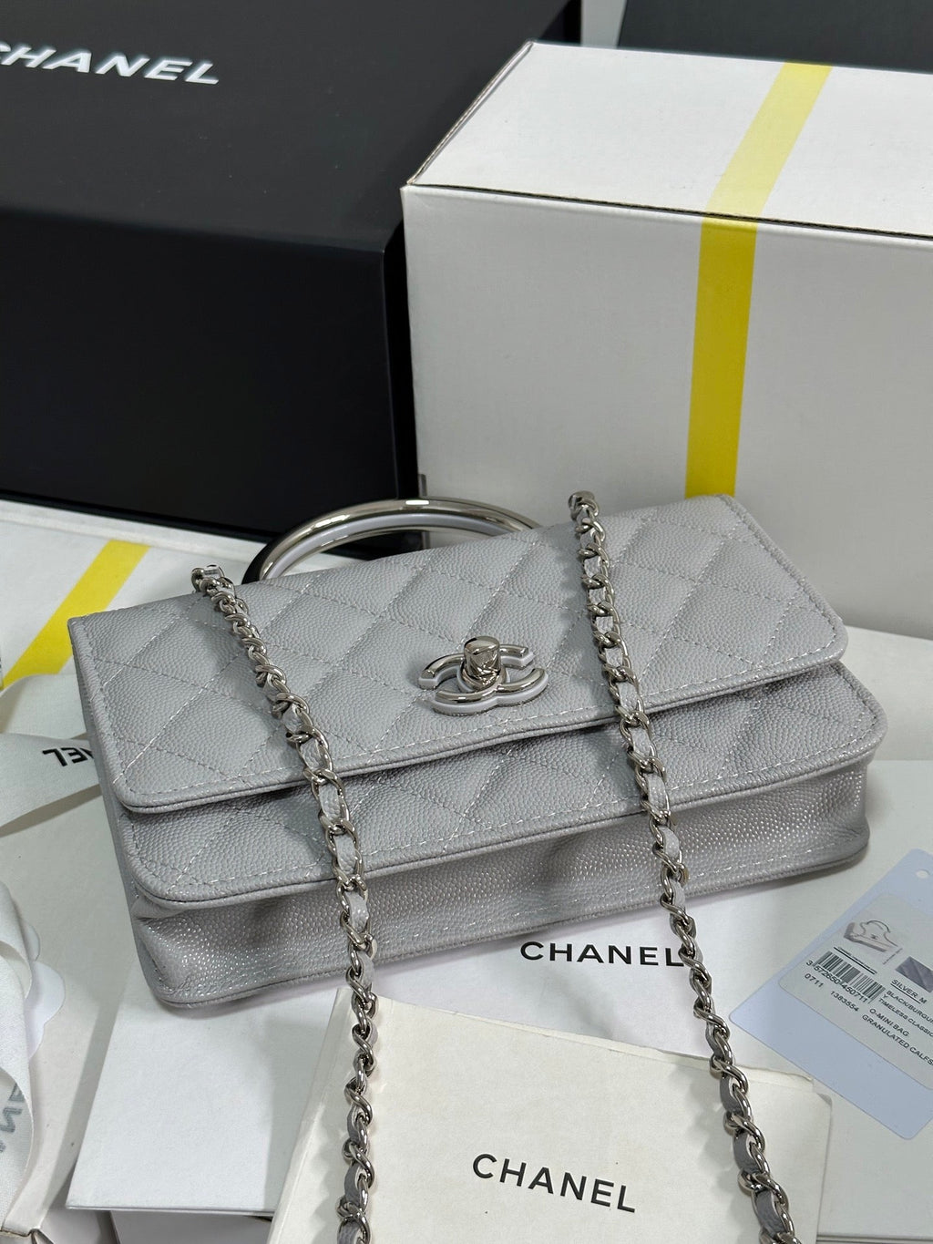 FLAP BAG WITH SILVER-TONE HANDLE 19 IN GREY SHINY CAVIAR SKIN