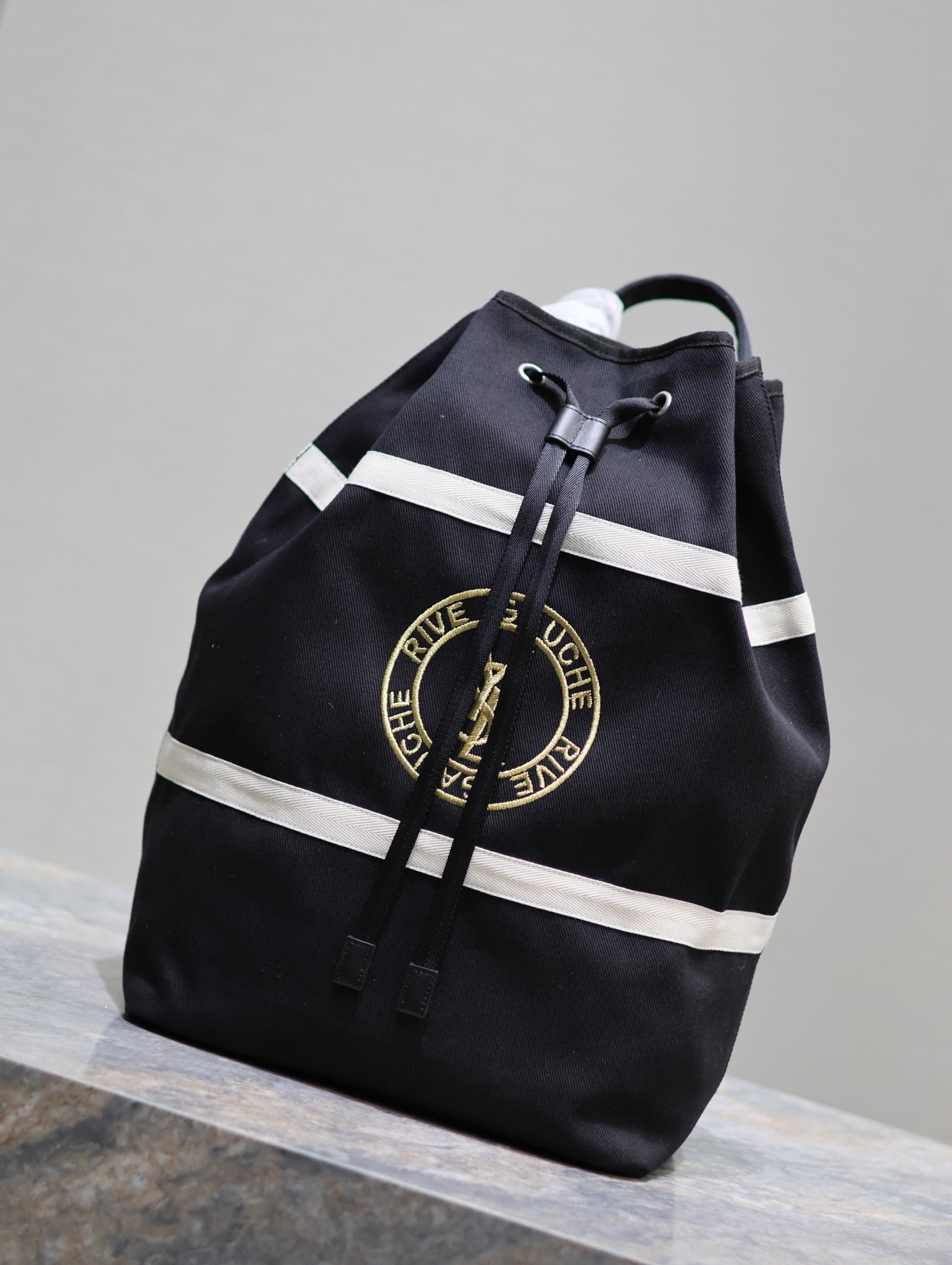 RIVE GAUCHE RUCKSACK 49 IN SCHWARZ-WEISSEM CANVAS