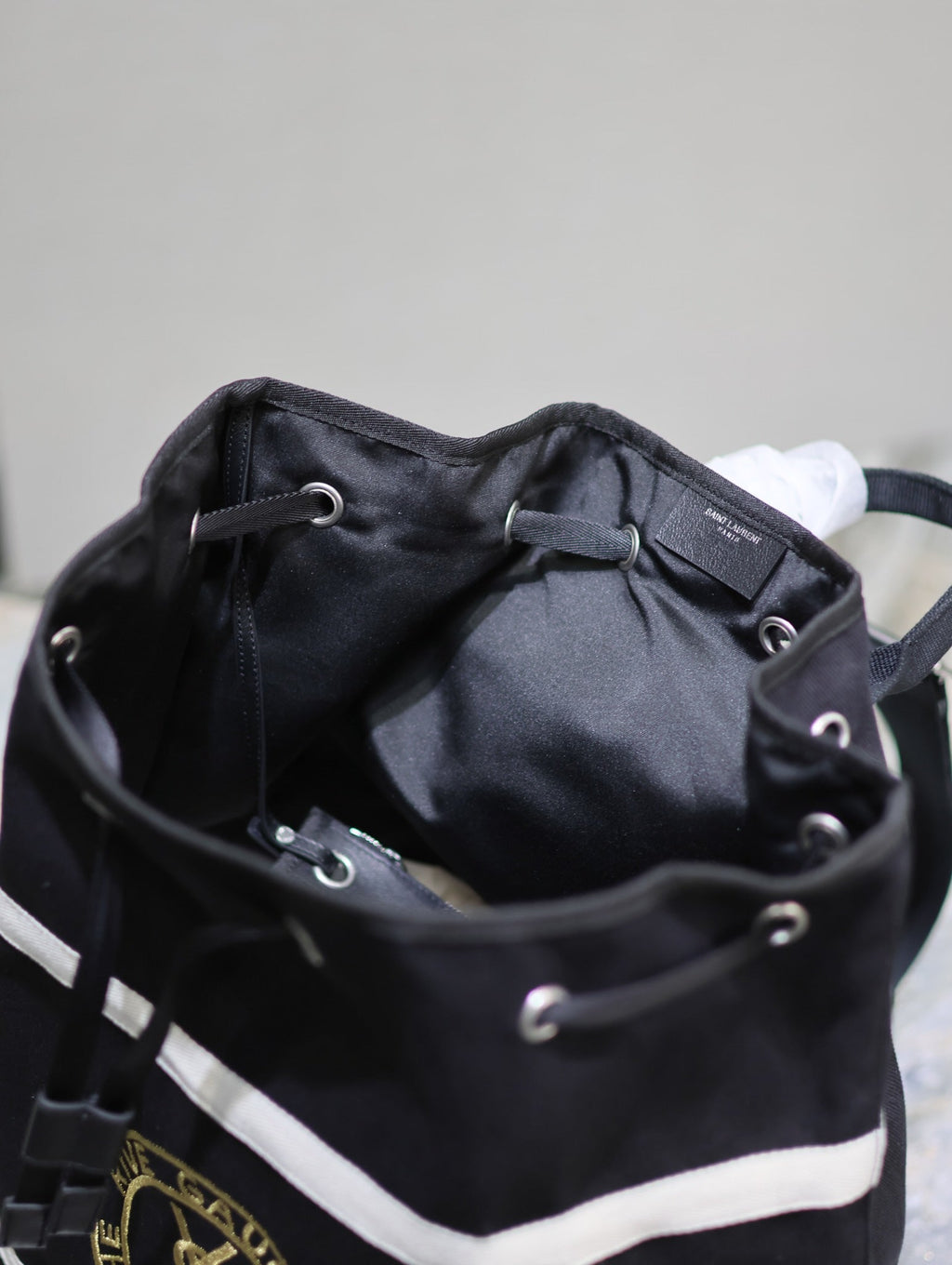 RIVE GAUCHE RUCKSACK 49 IN SCHWARZ-WEISSEM CANVAS