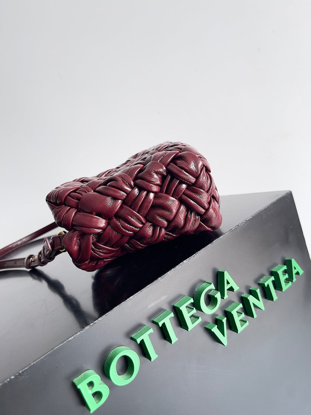 KELIMERO CHA-CHA CLUTCH 28,5 AUS BURGUNDERLAMMFELL