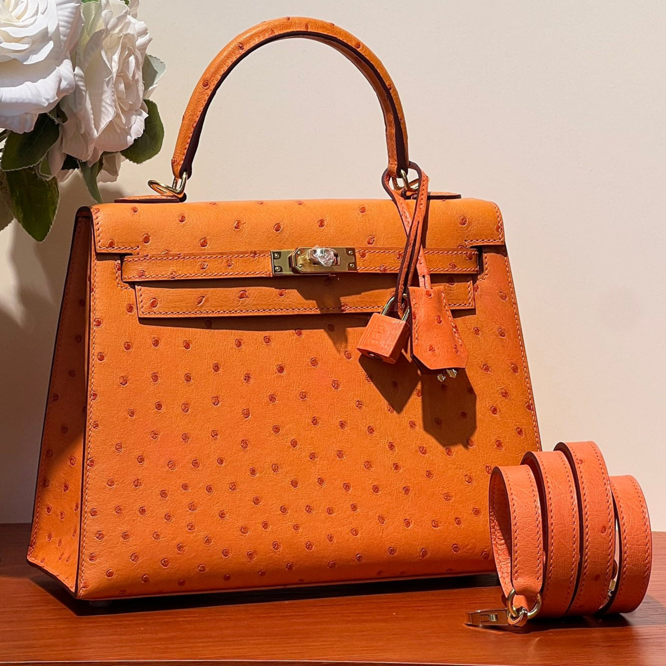 KELLY SELLIER 25 BAG IN FIRE ORANGE OSTRICH LEATHER WITH GOLD HARDWARE (MADE-TO-ODER)