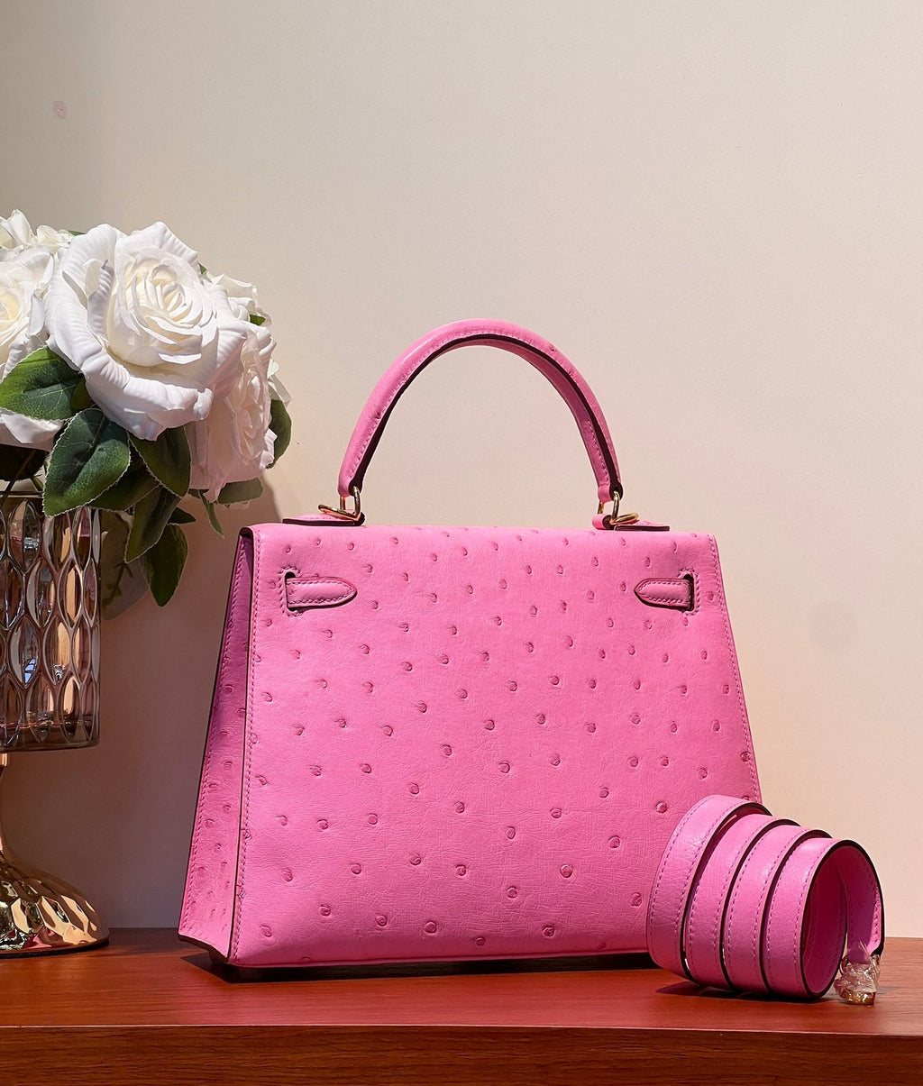 KELLY SELLIER 25 TASCHE IN PUPPENROSA STREIFENLEDER MIT GOLDENEN BESCHLÄGEN (AUF BESTELLUNG GEFERTIGT)