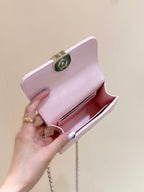 QUILTED FLAP BAG WITH HANDLE 18 IN BABY PINK LAMBSKIN GOLD HARDWARE