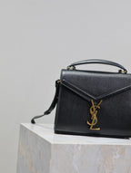 CASSANDRA MINI TOP HANDLE BAG 20 IN BLACK CALFSKIN GOLD HARDWARE