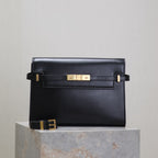 MANHATTAN MEDIUM 29 IN SCHWARZES GLATTES KALBSLEDER GOLDENE SCHNALLE