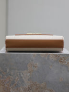 MANHATTAN SMALL 24 IN WEISSEM CANVAS UND BRAUNEN KALBSLEDER GOLDENE BESCHLÄGE