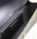 Klassische Kate Clutch 27 in schwarzem Lammleder mit goldenen Beschlägen