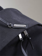 CITY-RUCKSACK 38 AUS SCHWARZEM CANVAS MIT WEISSEM GESTICKTEM LOGO