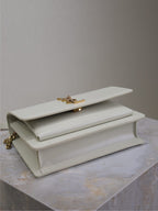 SUNSET KLEINE TASCHE 19 IN WEISSEM KALBSLEDER GOLDENE BESCHLÄGE