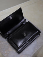 SUNSET KLEINE TASCHE 19 IN SCHWARZEM KALBSLEDER SCHWARZE BESCHLÄGE